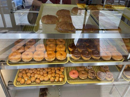 Ham and cheese croissants, sausage kolaches, and various donuts