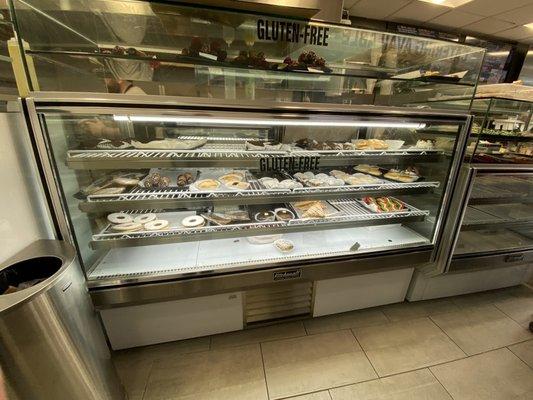 This entire display case is Gluten-free of cookies, turnovers, donuts, and cannolis.