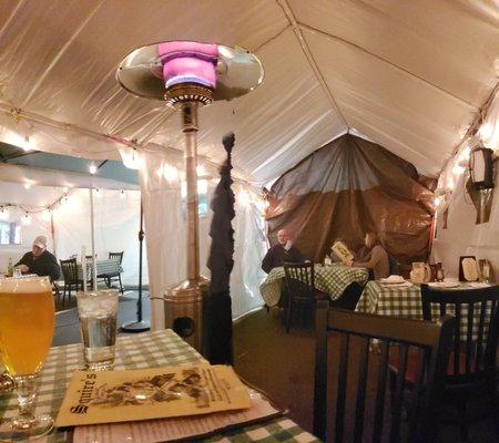 This tent with heaters is the COVID19 outdoor dining room