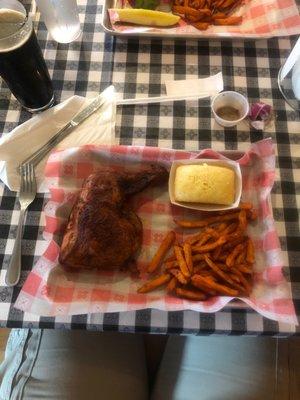 Smoked chicken quarter and sweet potato fries.