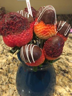 Valentines Day in a blue vase? With not enough chocolate on each strawberry. Really?