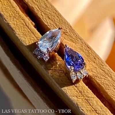 Limited Edition Jewelry-  genuine blue topaz & diamonds set in 14k rose gold along side genuine tanzanite & diamonds set in 14k yellow gold.