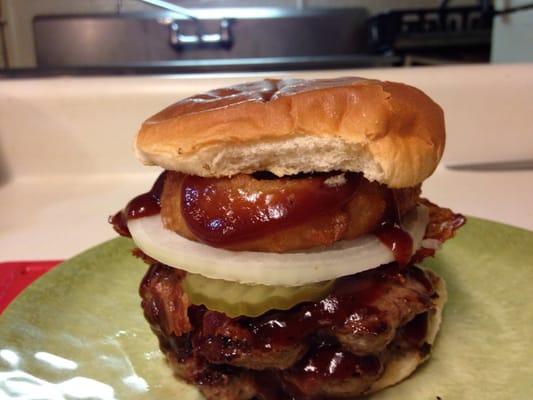 Our Double Western burger. Two 1/4 lb. pattys with bacon, sweet vidalia onion, pickles, onion ring & a tangy sweet BBQ sauce.