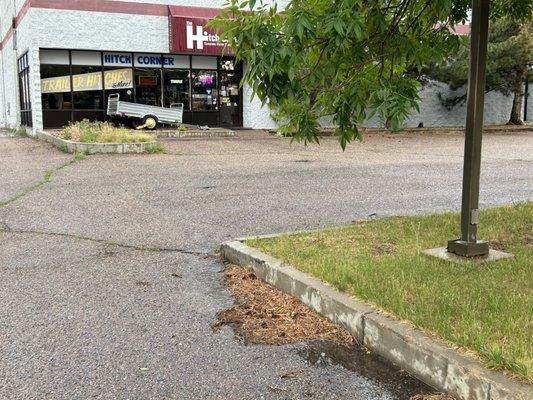 Incidentally don't hit that corner as you enter the parking lot, you may damage your tire.