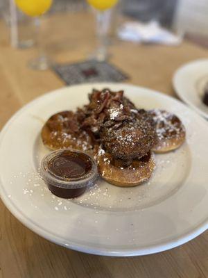 Waffles with bacon topped with honey maple syrup