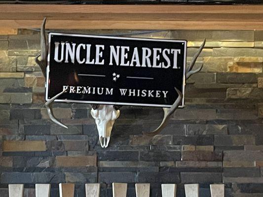 The sign that represents the Uncle Nearest's whisky.