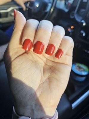 Left hand Christmas red gel nails.