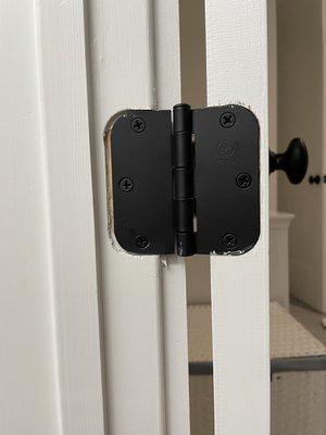 Our door hinges weren't measured properly. This is how every door in the house looks