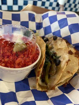 Vegetarian tacos and hot Cheetos elote