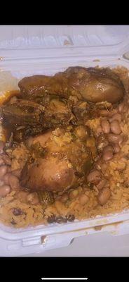 stew chicken with rice and peas and some beans