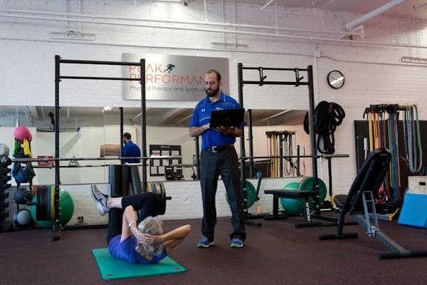 Mike working with a patient.