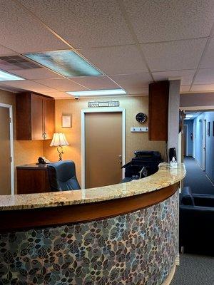 Reception Desk is in the heart of the second floor, easily accessible to you and your guests