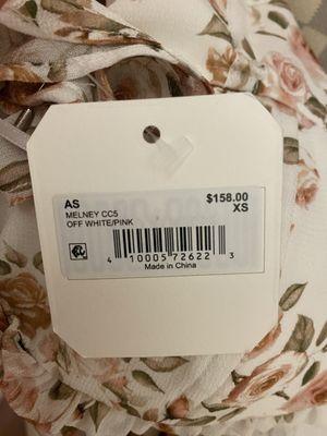 Brand new dress with tag on.. destroyed by Miss Ann's alterations. She refused to refund me for my dress