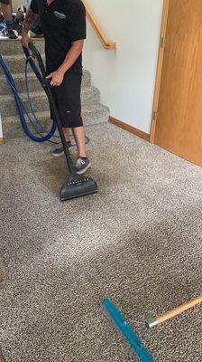 Cleaning the last dirty spot on the carpet (that's not a shadow!)