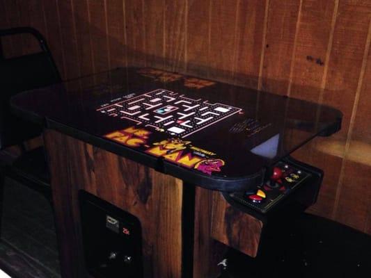 Retro video game table with dozens of classic games