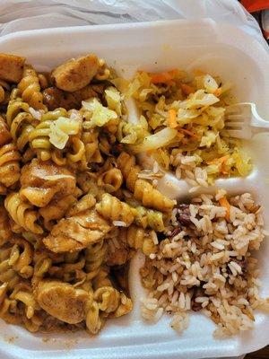 Jerk chicken pasta, rice and beans and steamed cabbage