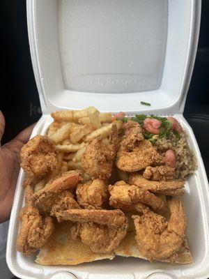 Shrimp platter with shrimp fried rice and fries