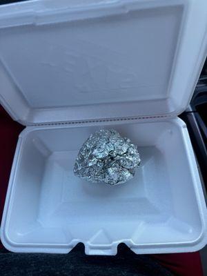 This apparently is what a $15 caesar salad consists of at Texas Roadhouse Willoughby. A small chunk of chewed up chicken in a foil ball!