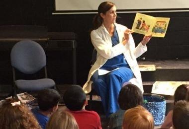 Dr. Jessica Clark teaching preschoolers about Dental Health.