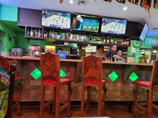 A photo of the bar from a table in the bar