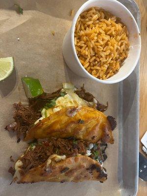 Birria tacos and add a side of rice