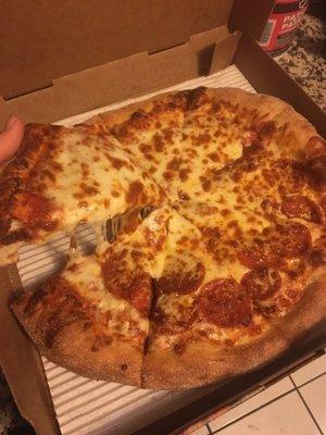 Medium extra cheese with half pepperoni delivered. Mmmm cheese! Happy pregnant belly!