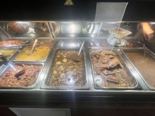 Baked turkey wings two types of gumbo and some more great sides food is great ever time I go!!!