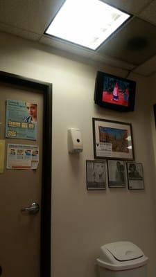 TV for the kids with preplay kids friendly movies.  Restroom door to the left.