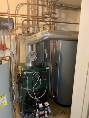 Installation almost complete. A new furnace can substantially lower your heating costs and keep your house so much warmer!