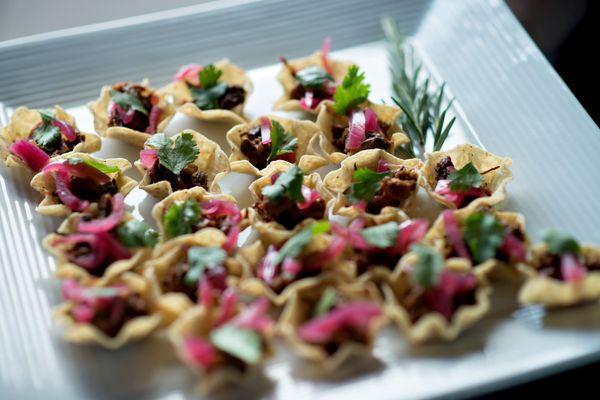 BBQ beef with pickled red onion