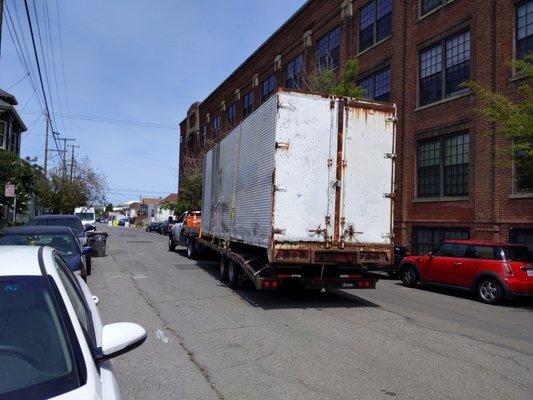 30' box truck body headed for the scrap yard to be recycled.