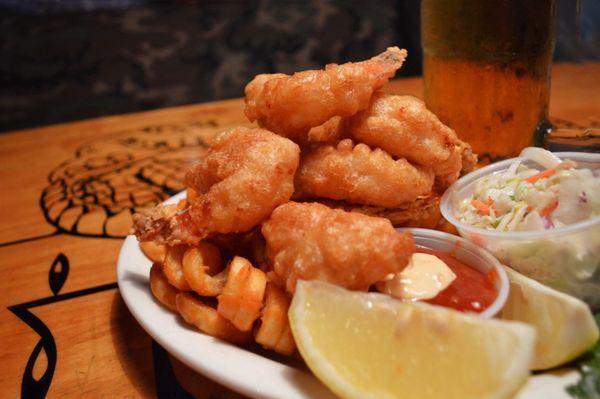 Dive into a seafood paradise with our delectable Fried Shrimp, perfectly paired with a squeeze of zesty lemon!