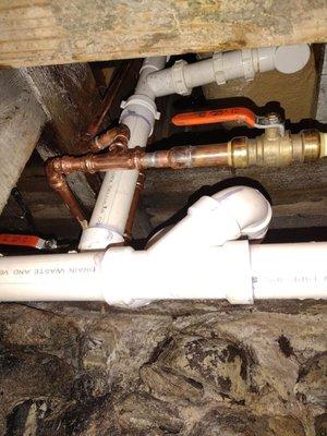 Copper piping for the shower and shut off valves.