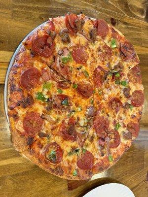 North Shore with pepperoni, sausage, ham, onion and green pepper.