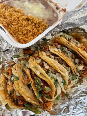 Chicken tacos, rice and beans