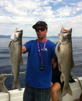 Capt. Stevo holding these two mackinaw beauties!