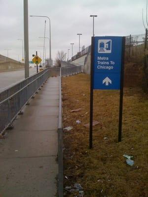 The ramp to the platform for trains heading downtown.