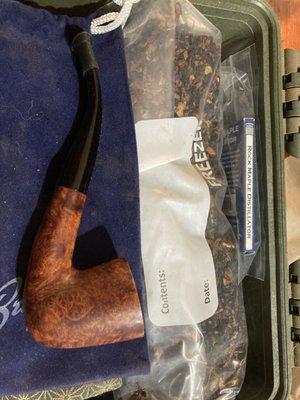 Pipe kit! Brigham pipe and some good smelling stuff.