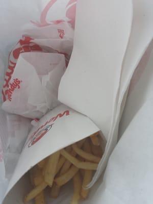 My lunch spicy chicken sandwich no mayonnaise and cheese ,chocolate frosty and fries