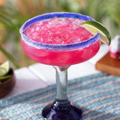 Dragon Fruit Margarita - Patrón Silver Tequila, triple sec, dragon fruit, key lime juice, sweet & sour with a sugar rim.