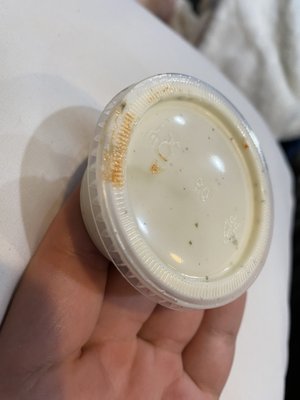 Cross contamination - this is how I was given ranch, with sauce on the lid from the employees unsanitary hands