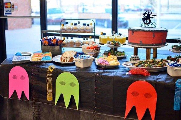 Pool table transformed into sweet deserts/cake table