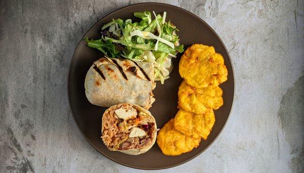 Burrito made with diced tofu marinated in spicy jerk seasoning and grilled to perfection. Served w/ plantains and salad.