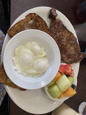 Steak with poached eggs & fruits