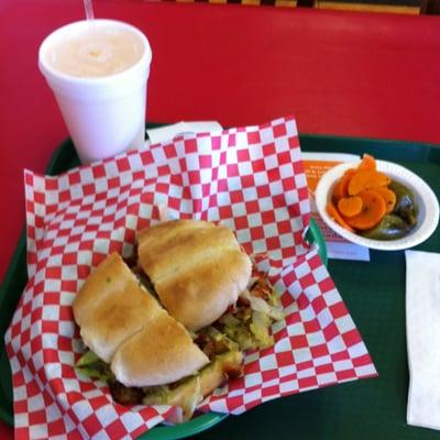 Torta of colita de pavo, agua de melon and pickled jalapeños