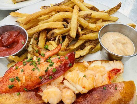 Lobster roll and house House-Cut Fries --lobster roll was good with old bay aioli sauce.  Also a bit too chewy and lacking flavor.