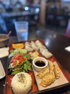 Gyoza and Spicy Tuna Roll with salad