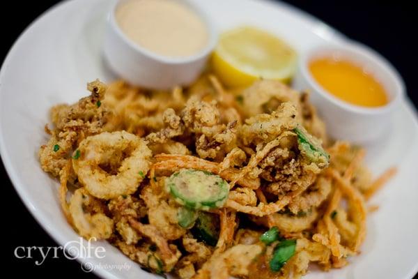 Fried Calamari with jalapenos, carrots, sweet n' sour and remoulade sauce.