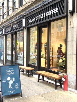 Two benches out front. New Blank Street Coffee. 01/04/22