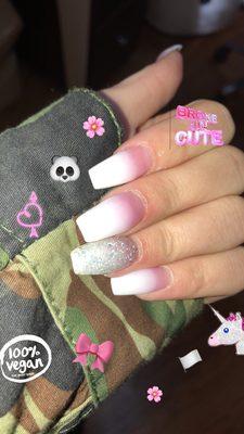 Pink to white ombré with a glitter accent nail and matte top coat